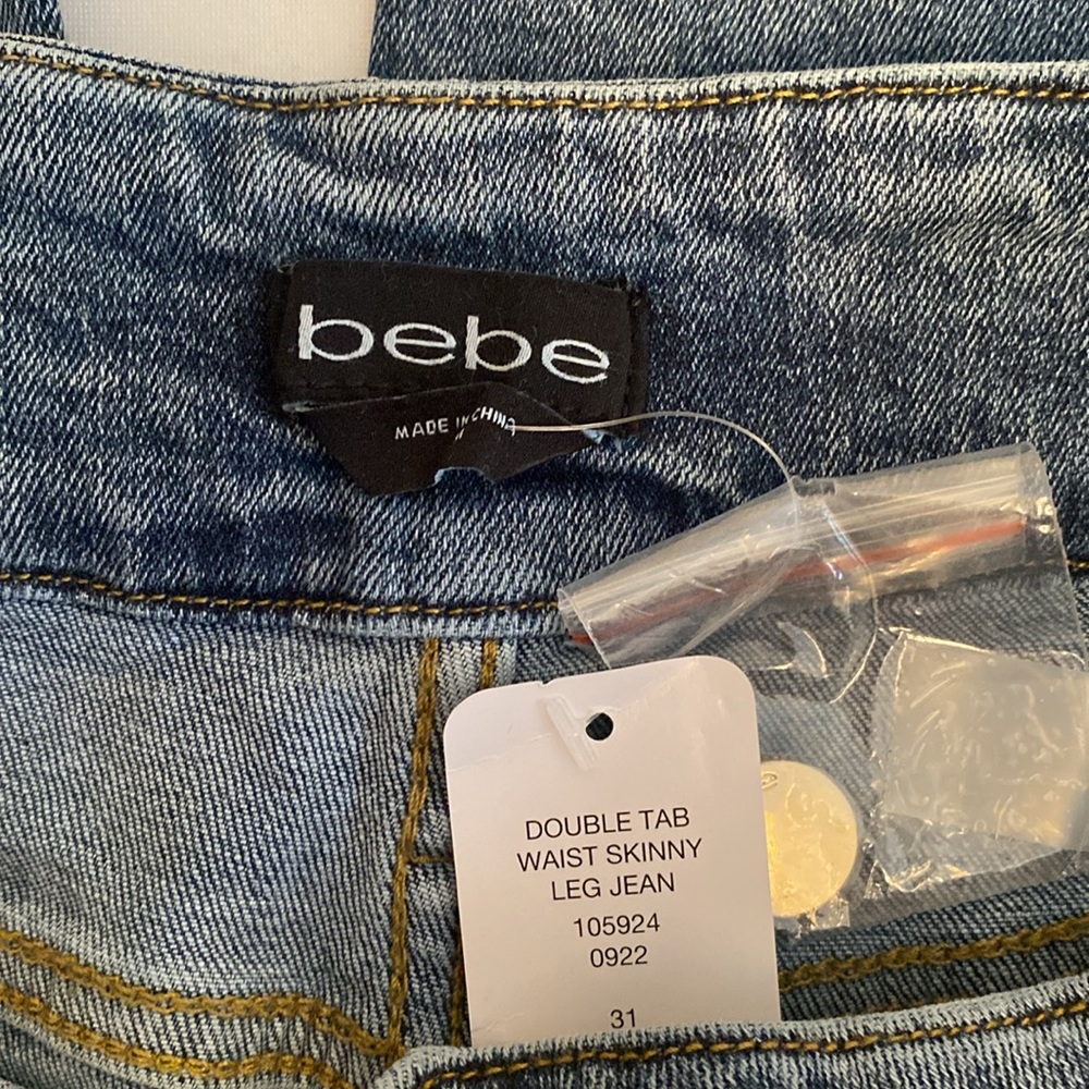 bebe • Double Tab Skinny Jeans - Picture 9 of 14